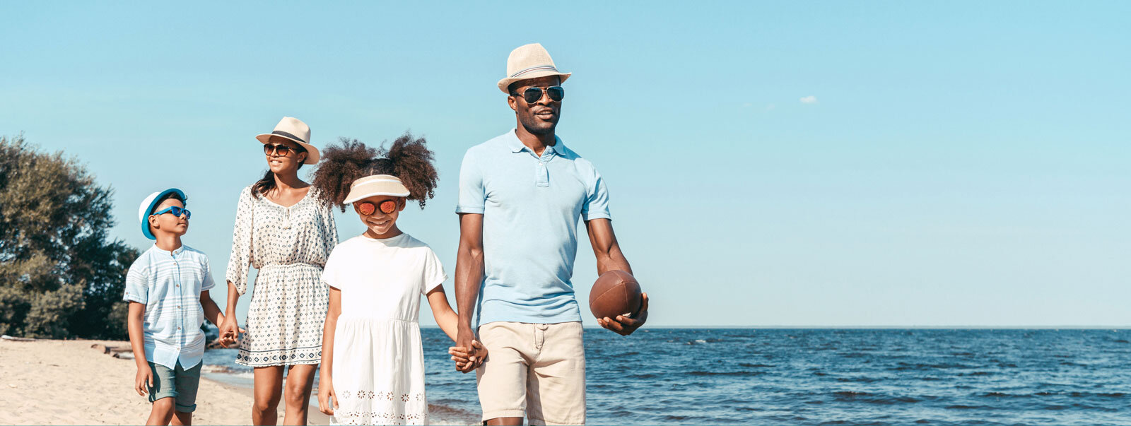 Family walking on a beach